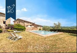 Refined farmhouse with a pool and a private lake for sale near Siena