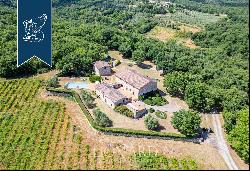 Refined farmhouse with a pool and a private lake for sale near Siena