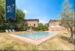 Refined farmhouse with a pool and a private lake for sale near Siena