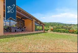 Charming farmhouse with a view over the surrounding vineyards for sale a few kilometres fr