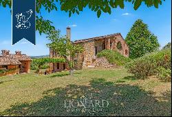 Charming farmhouse with a view over the surrounding vineyards for sale a few kilometres fr