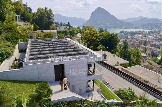 For sale in Lugano-Viganello: an elegant apartment with a private garden & stunning lake 