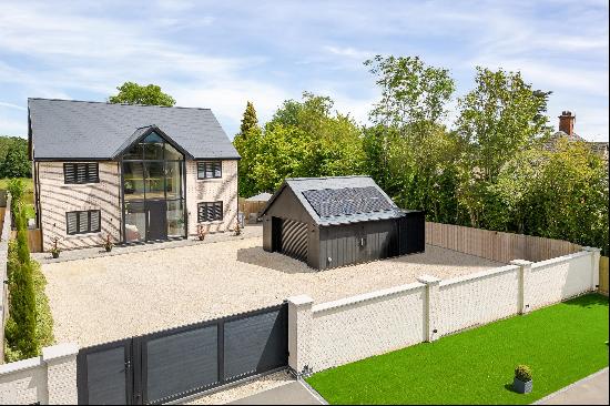 An outstanding 5 bedroom detached contemporary village house set in approx. 0.43 acres, co