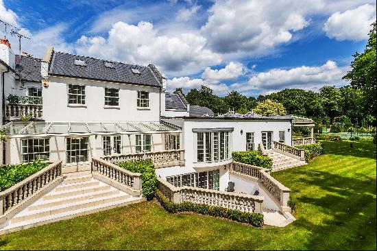 An exceptional lateral house with expansive gardens for sale in Cobham.