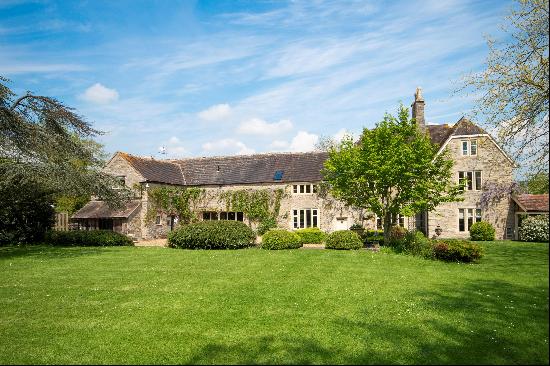 Set in a tranquil and private location, a beautiful period farmhouse and accompanying cott