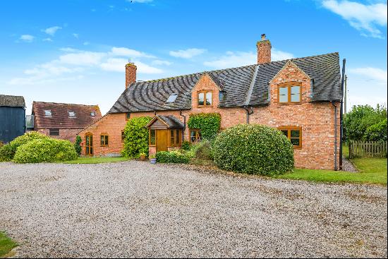 Set in over three quarters of an acre, a superb detached family home accompanied by a quit