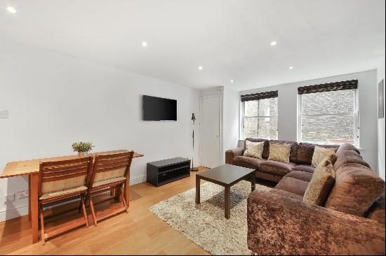 A wonderful one bedroom first floor flat located on one of London's finest garden squares 