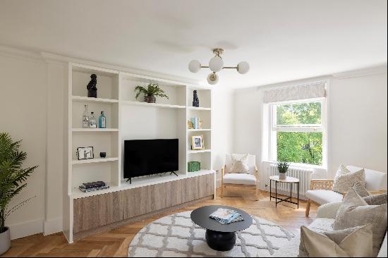 Impressive third and fourth floor apartment overlooking the gardens.