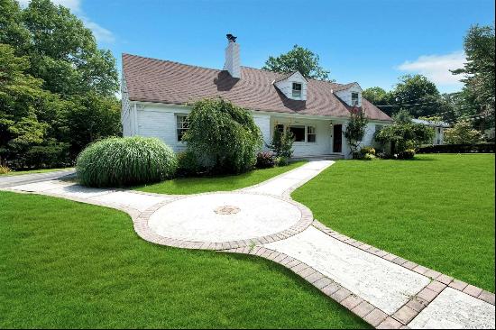 Welcome to this sunny brick expanded ranch in the prestigious Village of Oyster Bay. This 