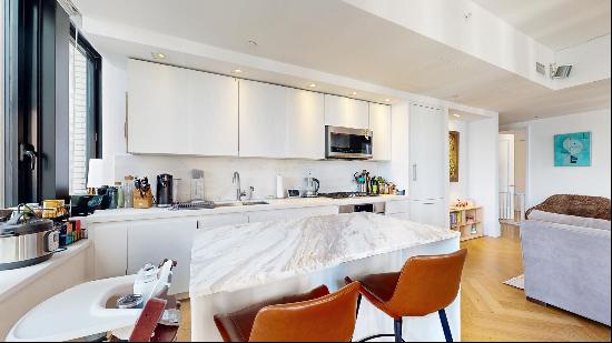 NEW LISTING: River views, quick access to public transportation, an elegantly re-imagined 