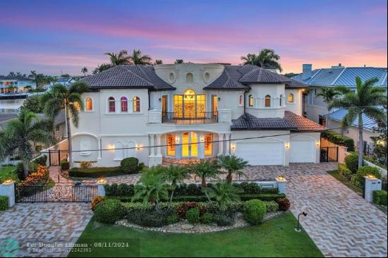 Extraordinary 3 story deepwater Modern Mediterranean Villa totals over 9,000 sf. One of th