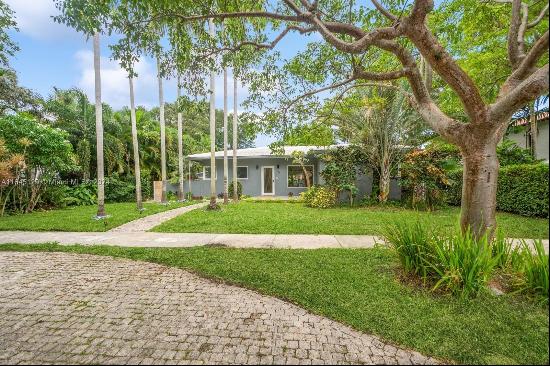 Discover the charm of this beautifully renovated Miami Shores home, nestled on a serene st