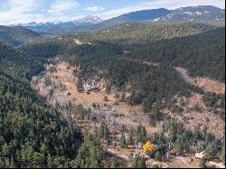 Rare Opportunity to Own 2 Charming Riverside Cabins in the Rocky Mountains