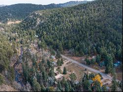 Rare Opportunity to Own 2 Charming Riverside Cabins in the Rocky Mountains