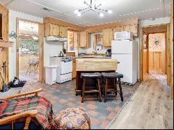 Rare Opportunity to Own 2 Charming Riverside Cabins in the Rocky Mountains