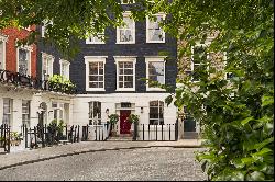 Double fronted Georgian townhouse in enviable garden square in Connaught Village