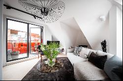 Completely renovated penthouse with outstanding rooftop terrace.