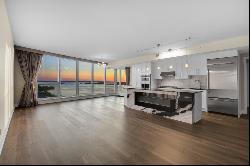 Spectacular Water & Sunset View 2-Bedroom + Den Penthouse