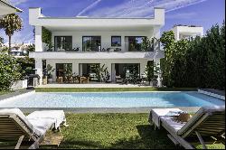 Luxury villa of modern elegance and unique location, bordering Puerto Banus, Marbella