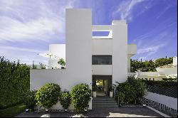 Luxury villa of modern elegance and unique location, bordering Puerto Banus, Marbella