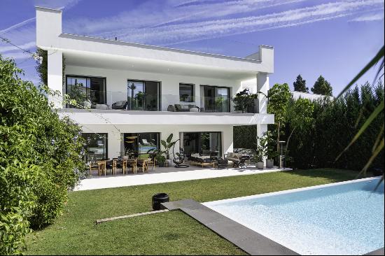 Luxury villa of modern elegance and unique location, bordering Puerto Banus, Marbella