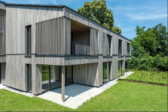 Ecological solid wood new build: villa half with stylish furnishings