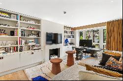 Impressive family home in the heart of Chelsea with access to private gardens.