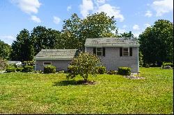 Stately Garage-Barn nestled on .53 Acres on private road just a few miles to His