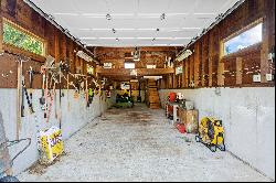 Stately Garage-Barn nestled on .53 Acres on private road just a few miles to His