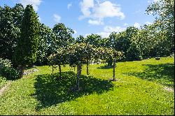 Stately Garage-Barn nestled on .53 Acres on private road just a few miles to His