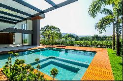 Contemporary mansion with 5 suites and Aurora Grei design in Alphaville Barra