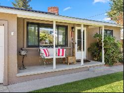  Charming 4-Bedroom Home with Modern Upgrades and Backyard Oasis