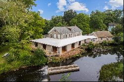 Own a Piece of History on .74 Acre with Falls River Waterfront!