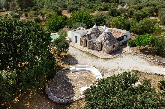 Charming trulli complex with a swimming pool