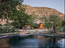 Southwestern Paradise Amidst Vineyards and Creek Frontage