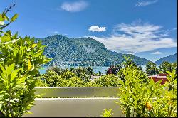 Lugano-Castagnola: elegant penthouse apartment for sale, offering expansive panoramic vie