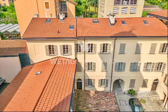 Elegant duplex penthouse apartment for sale in the historic center of Lugano