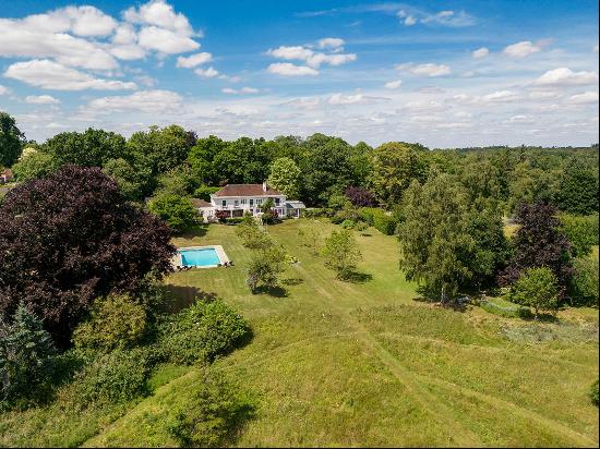 A perfect family home adjacent to the historic Highclere Estate.