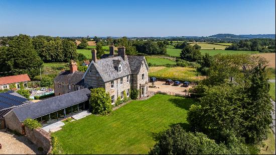 A fine period country house set in about three acres with views across rolling countryside