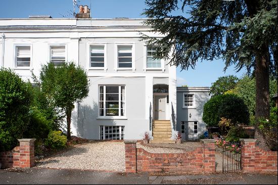 A beautifully appointed period family home with excellent garden and private parking in hi