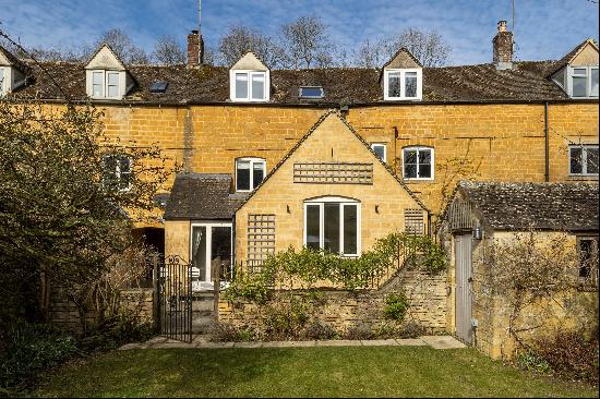 A delightful Cotswold stone period cottage in sought-after village location