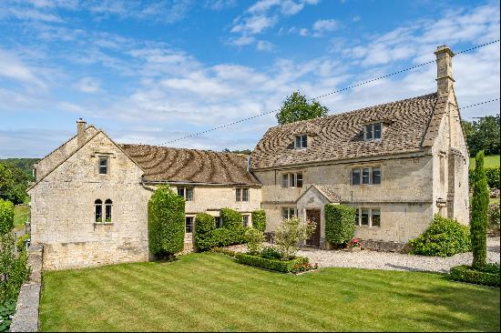 A fabulous Grade II listed Cotswold stone farmhouse with additional accommodation and a st