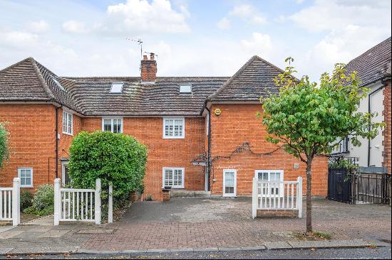 A five bedroom semi-detached house with off street parking and West facing garden for sale