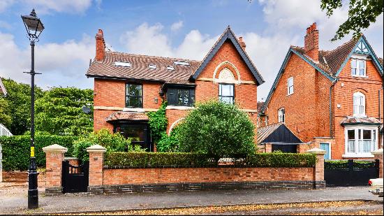 A handsome and beautifully appointed 7 bedroom family home with the most magical of garden