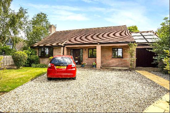 Rare opportunity to purchase a charming detached bungalow with off street parking, garden 