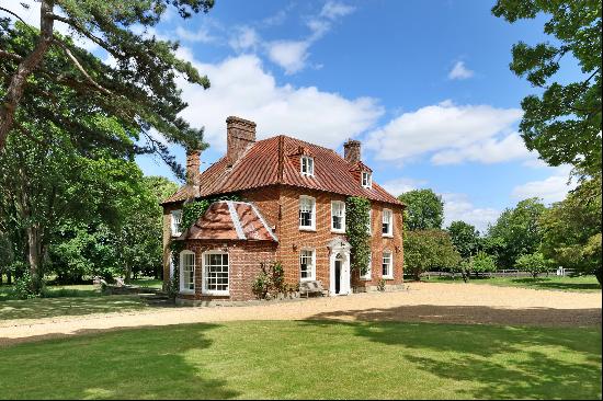 A fine Georgian manor house with a cottage, set in open countryside, under 40 minutes by t