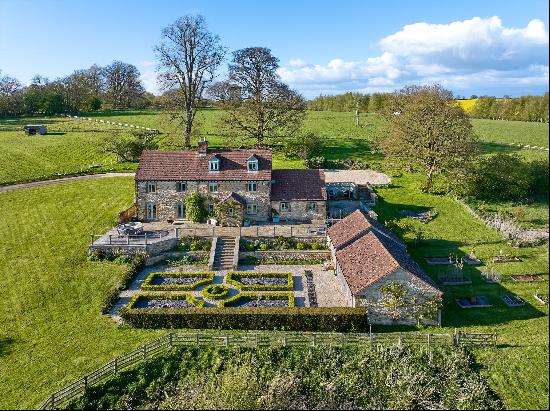 An attractive house with land and views on the edge of the popular village of Great Tew, w