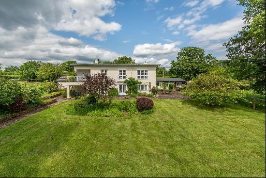 A handsome family house in need of some modernisationand refurbishment, in a superb rural