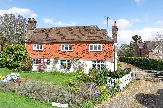 An attractive and historic 4 bedroom village house with superb ancillary accommodation and