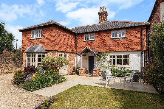 A detached picturesque cottage, in the heart of the village.